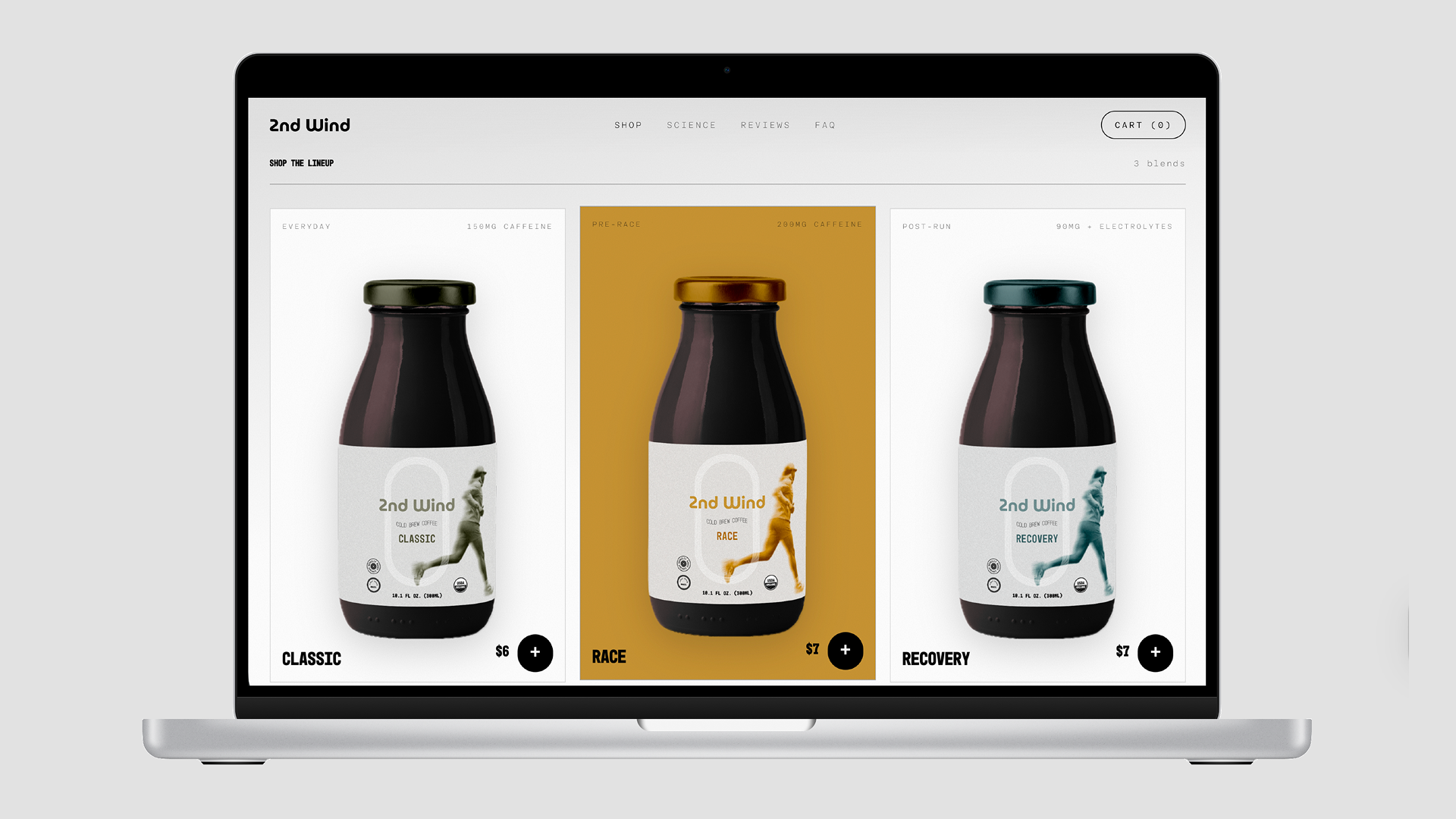 2nd Wind website shop: three bottle variants on a laptop