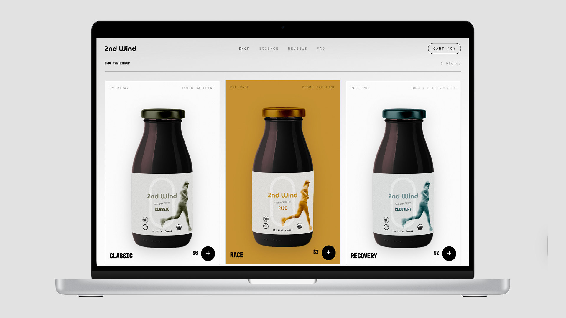 2nd Wind website shop: three bottle variants on a laptop